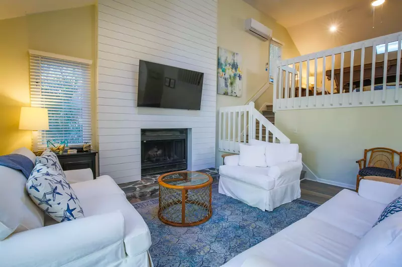 Follow this staircase in the living room to the game room and loft.