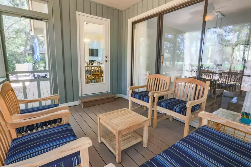 The screened porch is the perfect spot for your morning coffee or your favorite evening beverage.
