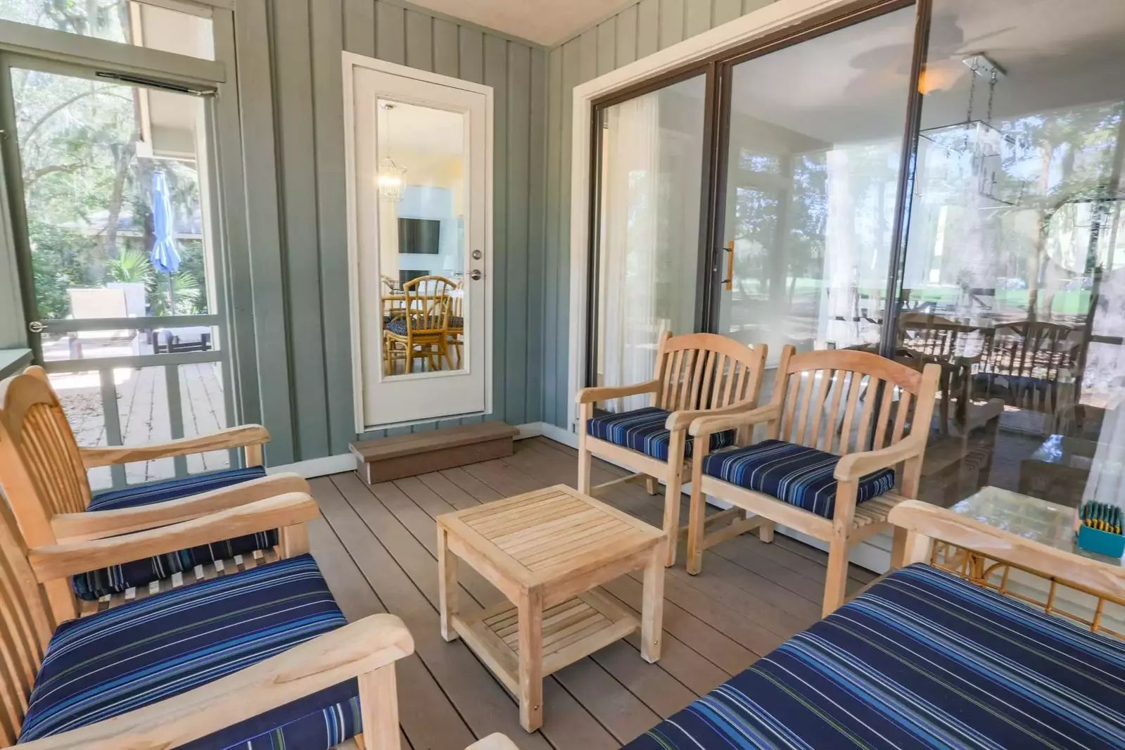 The screened porch is the perfect spot for your morning coffee or your favorite evening beverage.