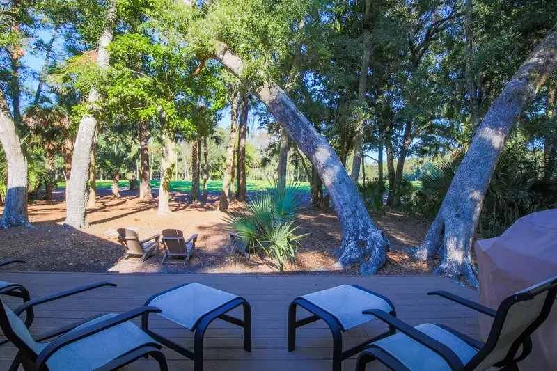Listen to the birdsong and other soothing sounds of Kiawah Island's maritime forest on our spacious back porch.