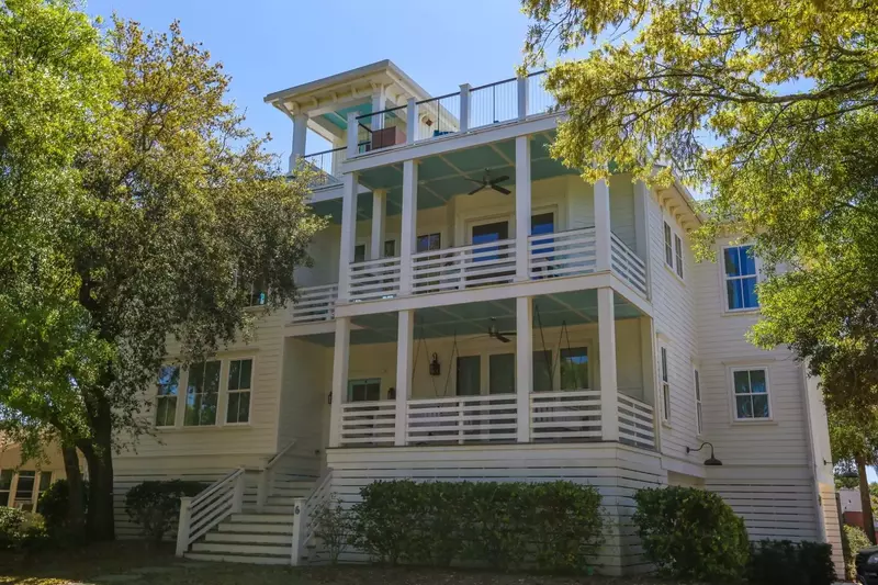 Sun, Sea and Stars is a beautful, 5 bedroom home with a roofdeck and two covered porches.