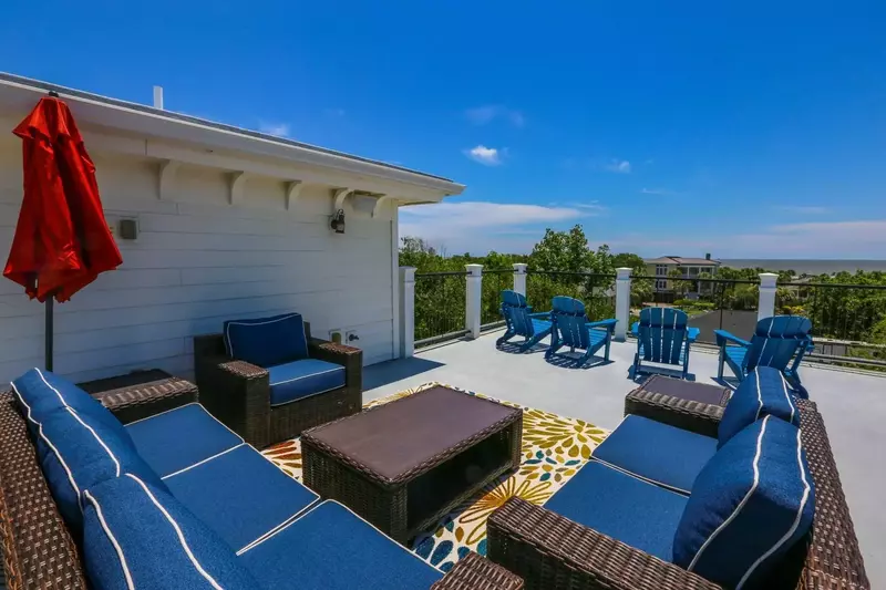 The rooftop deck on the third floor of the home is the perfect spot to start or end your day.