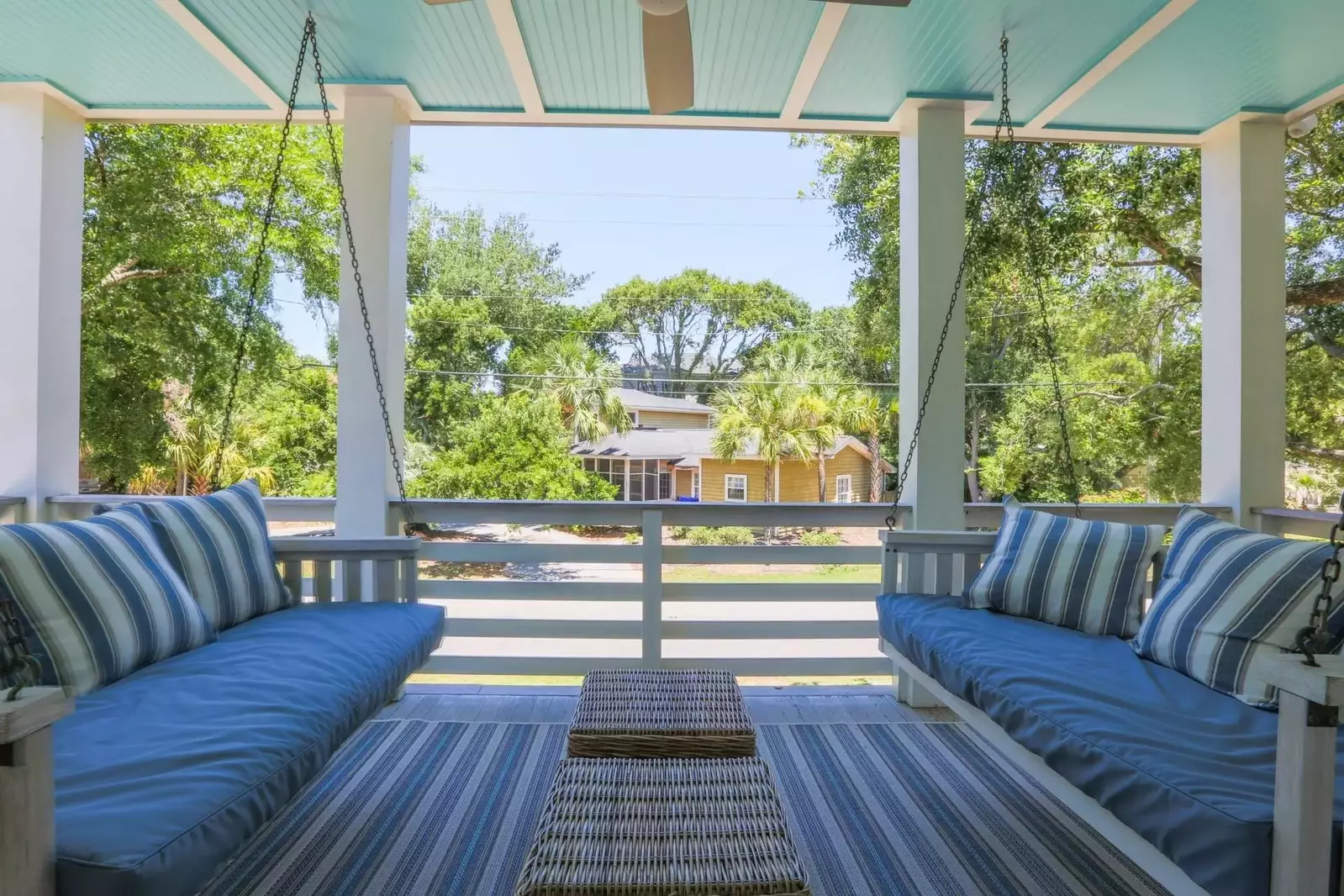 The covered porch off of the lower level master suite has two swing beds.