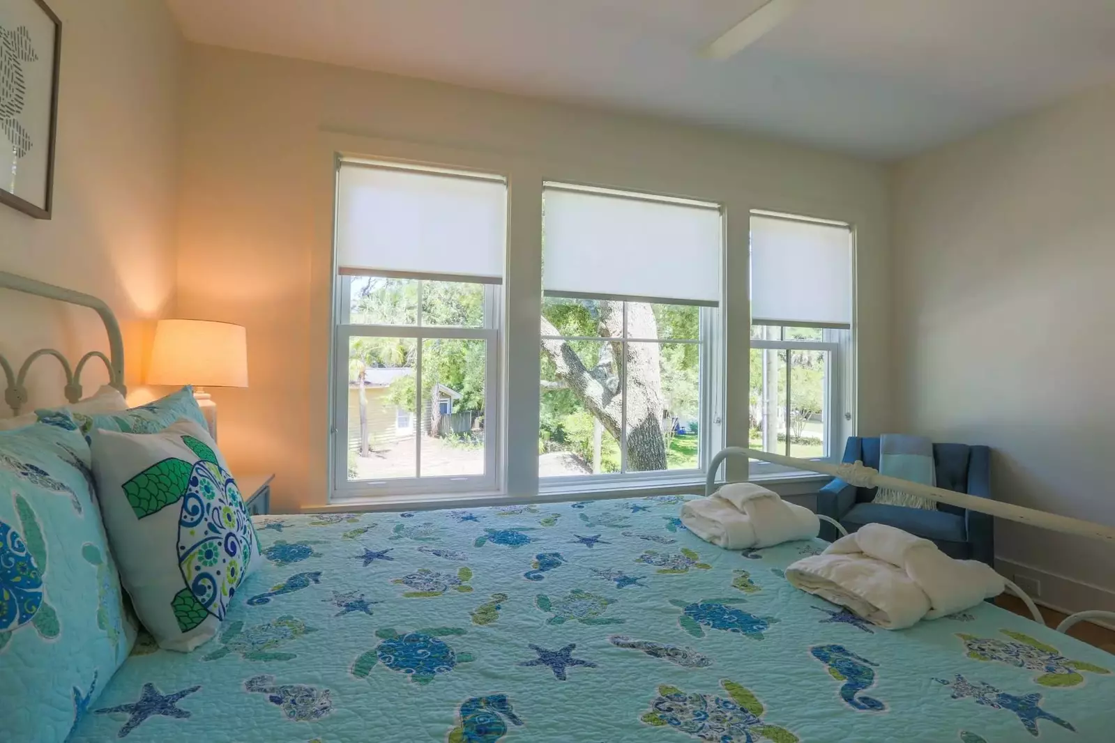 This guest bedroom is located on the ground floor of the home and looks out onto the front yard.