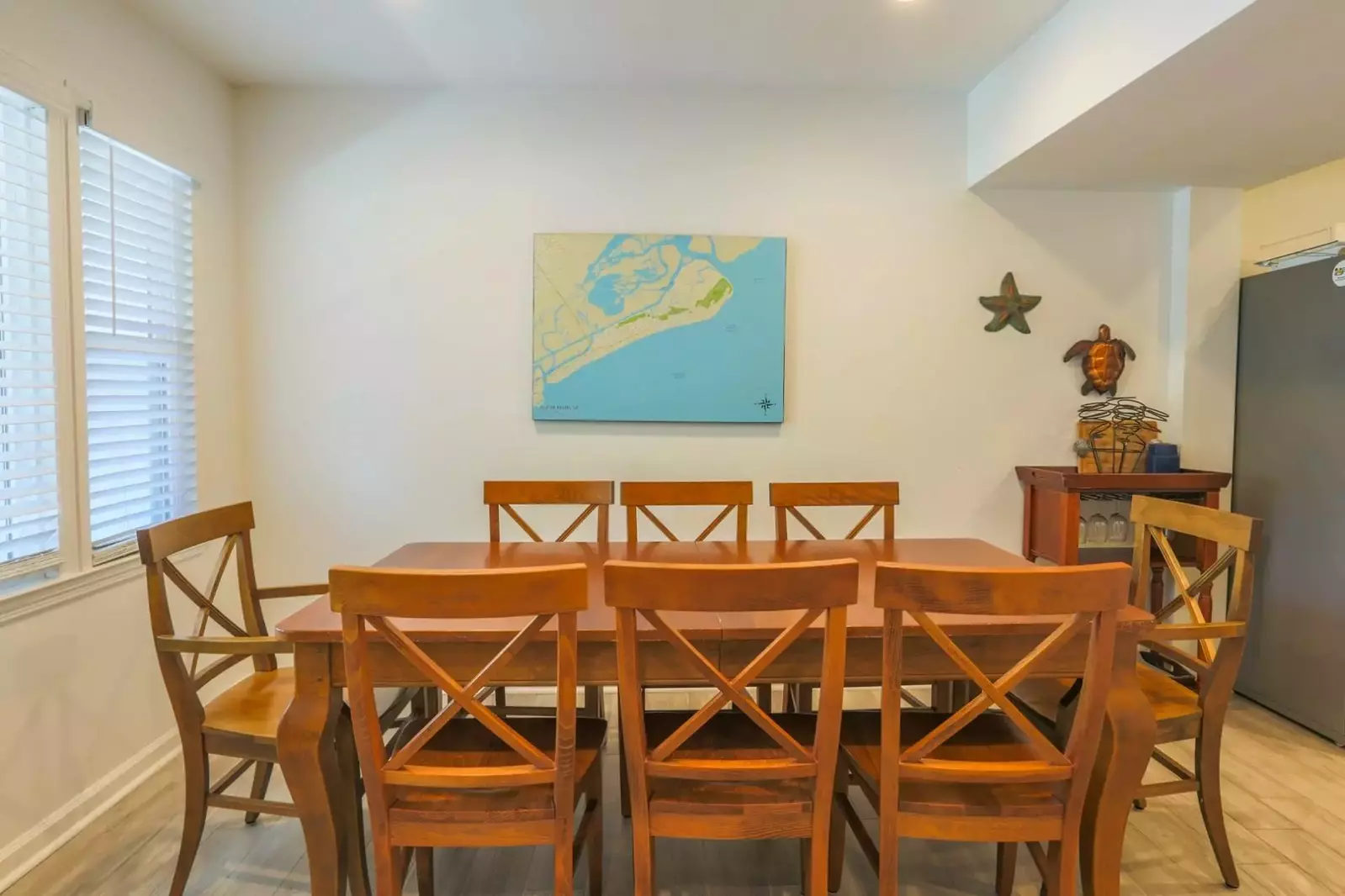 The indoor dining table in Carolina Breezes East seats 8.