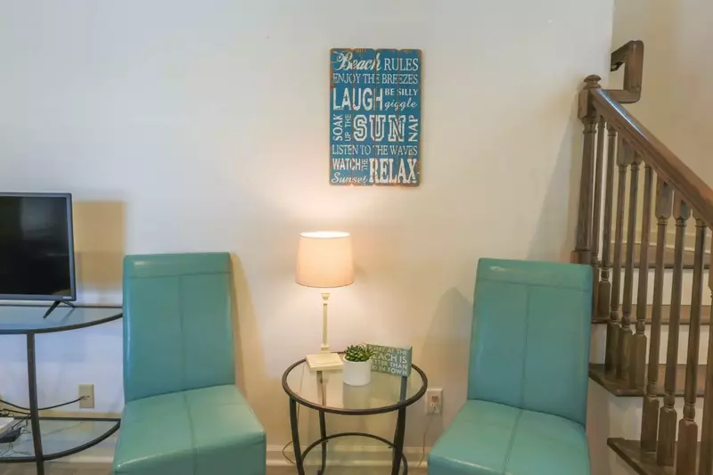 When you enter the front door, you'll find a seating area and stairwell to the second floor.