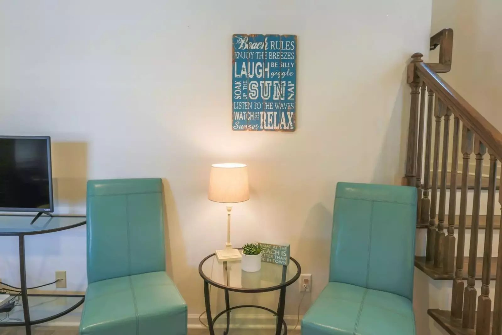 When you enter the front door, you'll find a seating area and stairwell to the second floor.