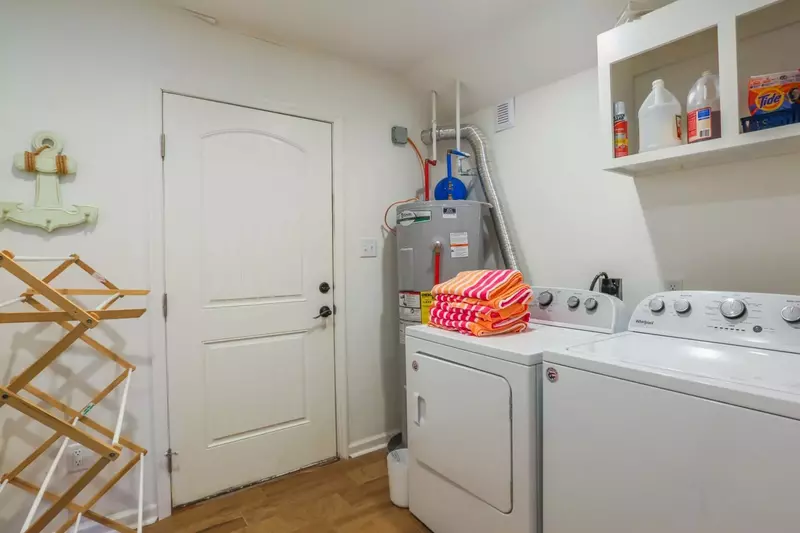 There is a full sized washing machine & a dryer on the first floor of the home.