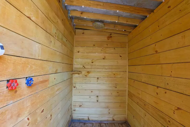 This outdoor shower is the perfect spot to rinse away the sand after a trip to the beach!