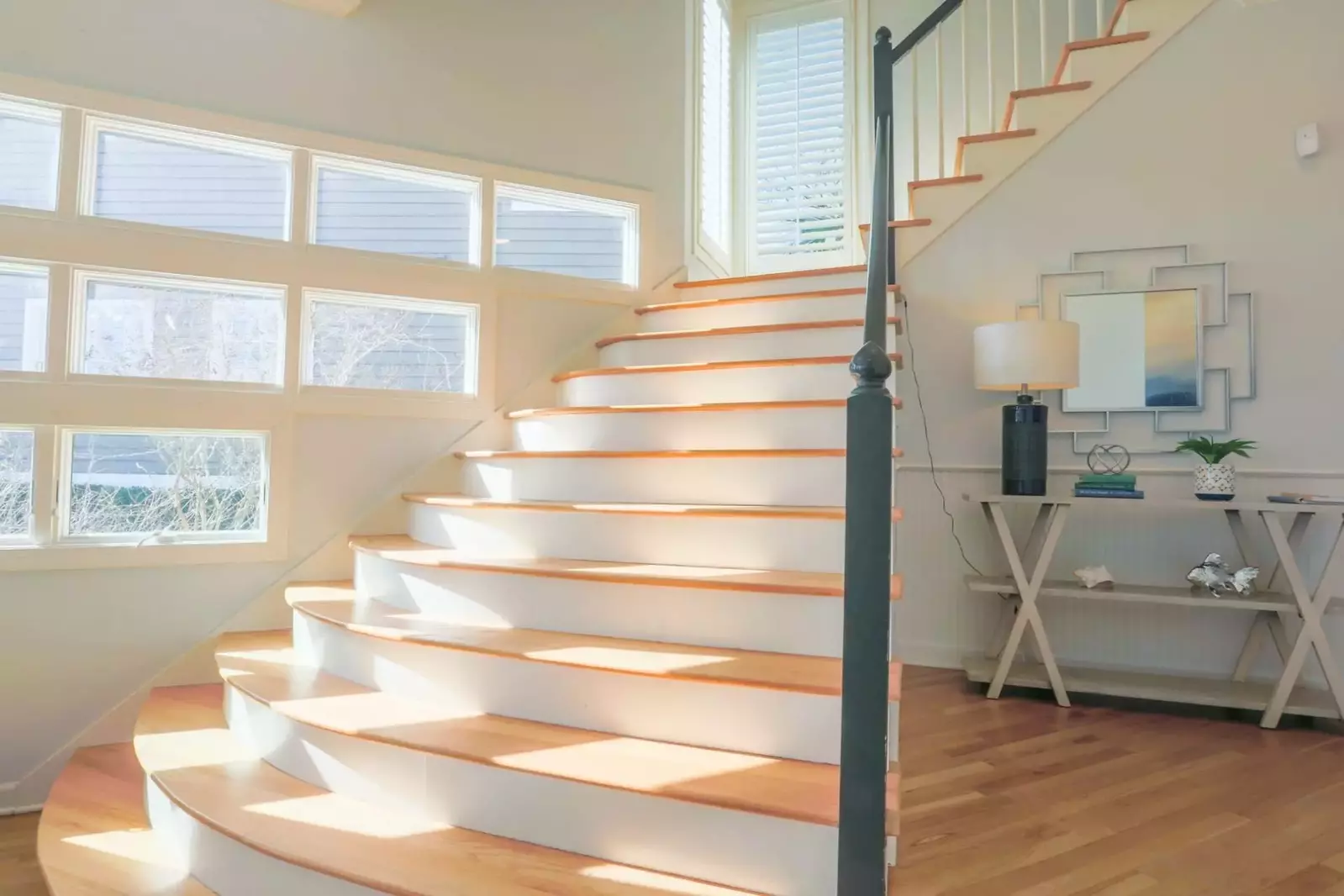 This stair case takes you to the three bedrooms & bathrooms on the home's second floor.