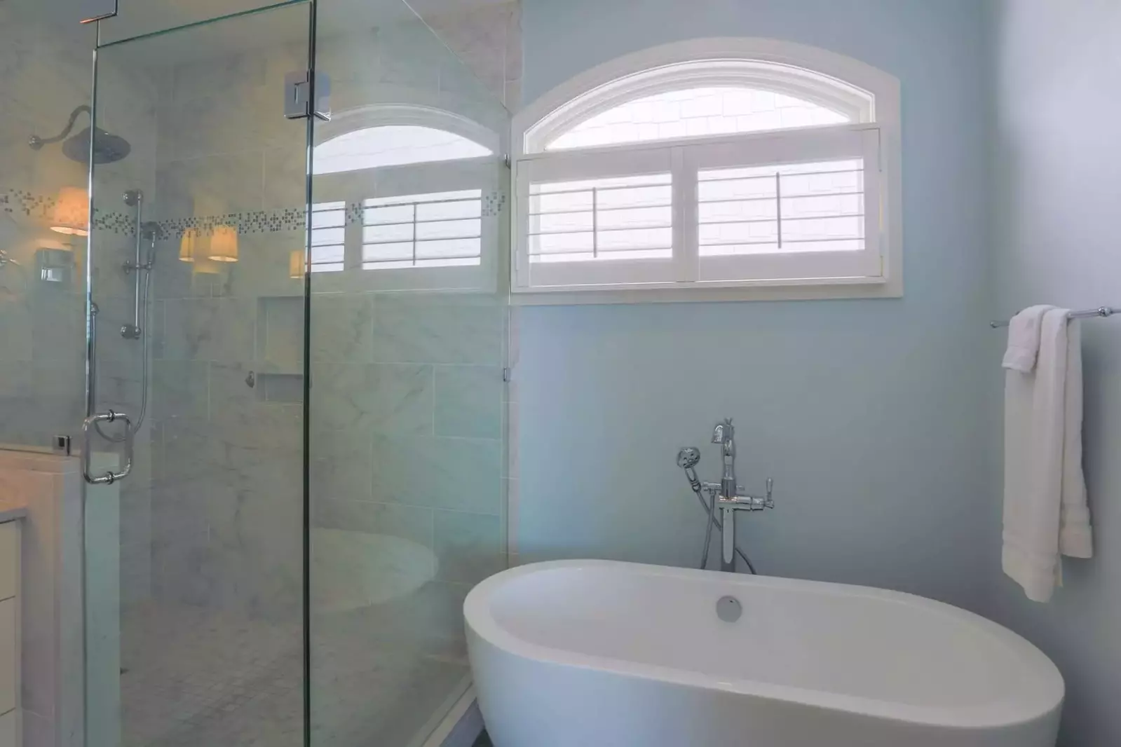 The en suite bathroom for the master bedroom also has a walk-in shower and soaking tub.