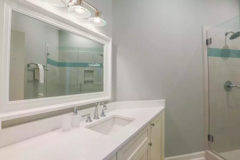 This bathroom is accessed from the hallway near the ground floor guest bedroom.