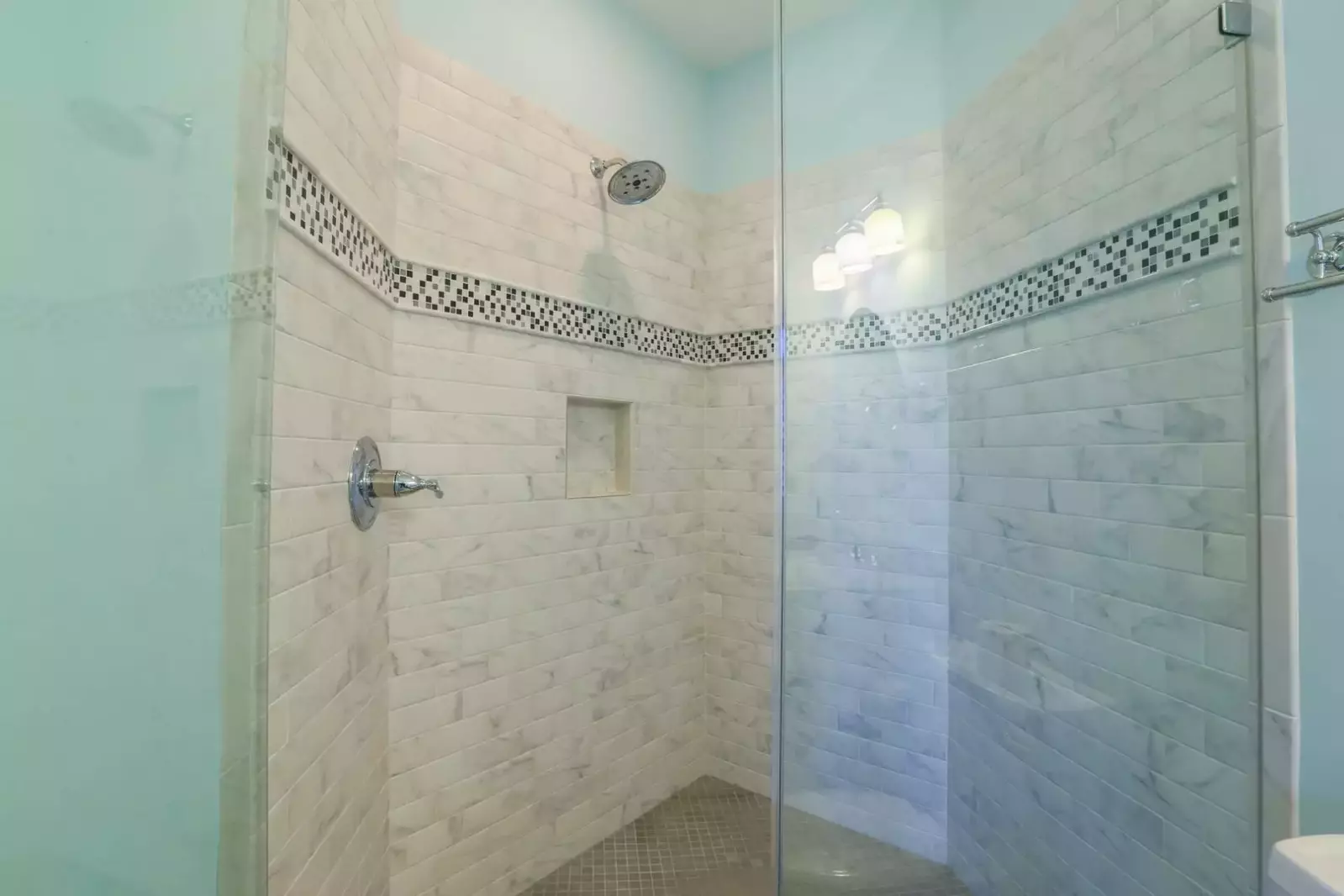 The en suite bathroom also has this gorgeous walk-in shower.