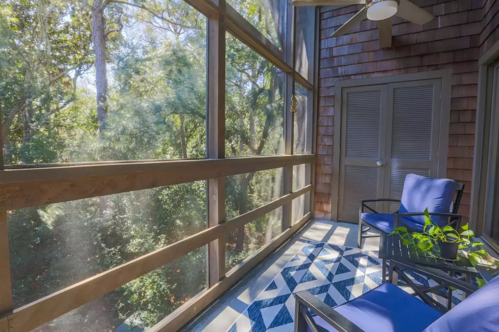 There is a washing machine and dryer in this closet on the screened porch.