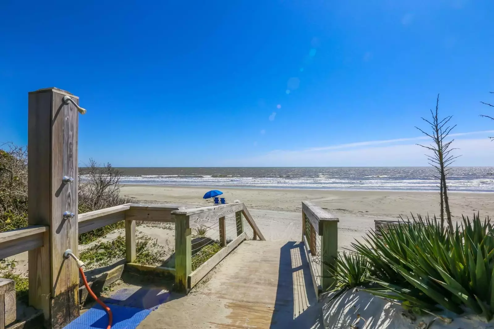 At the end of the boardwalk for the beach access point, you'll find this outdoor shower and the beach!