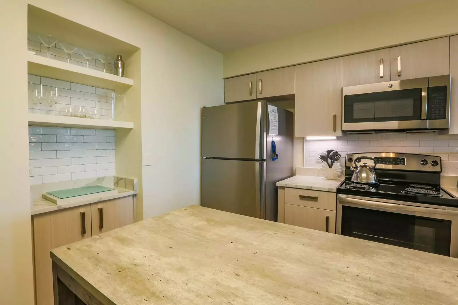 There's a spacious center island table to prepare your meals.