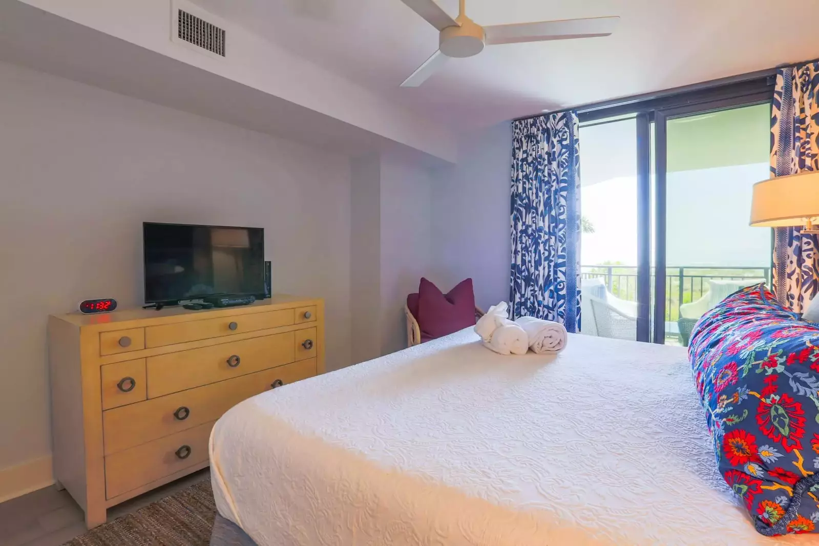 The master suite has ocean views and sliding door access to a private balcony.