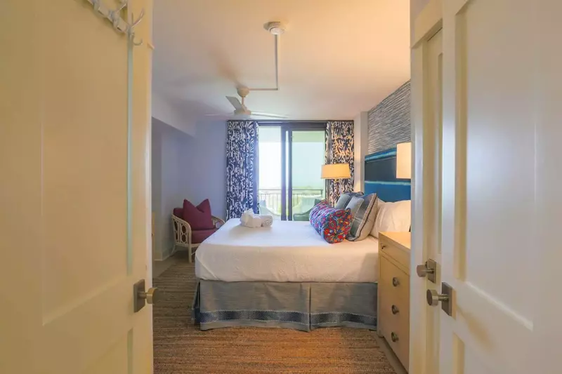 These double doors connect the master bedroom to its en suite bathroom.
