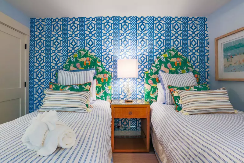 This guest suite features two twin beds.