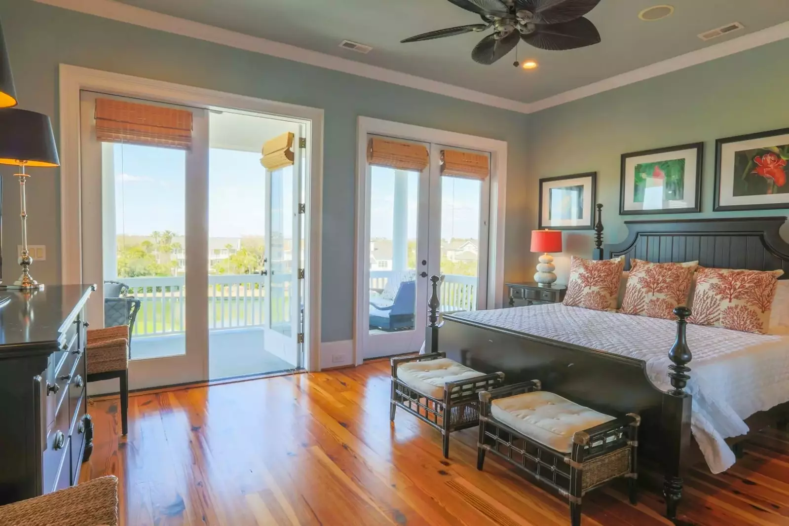 The master bedroom is located on the top floor of the home and features its own covered porch.