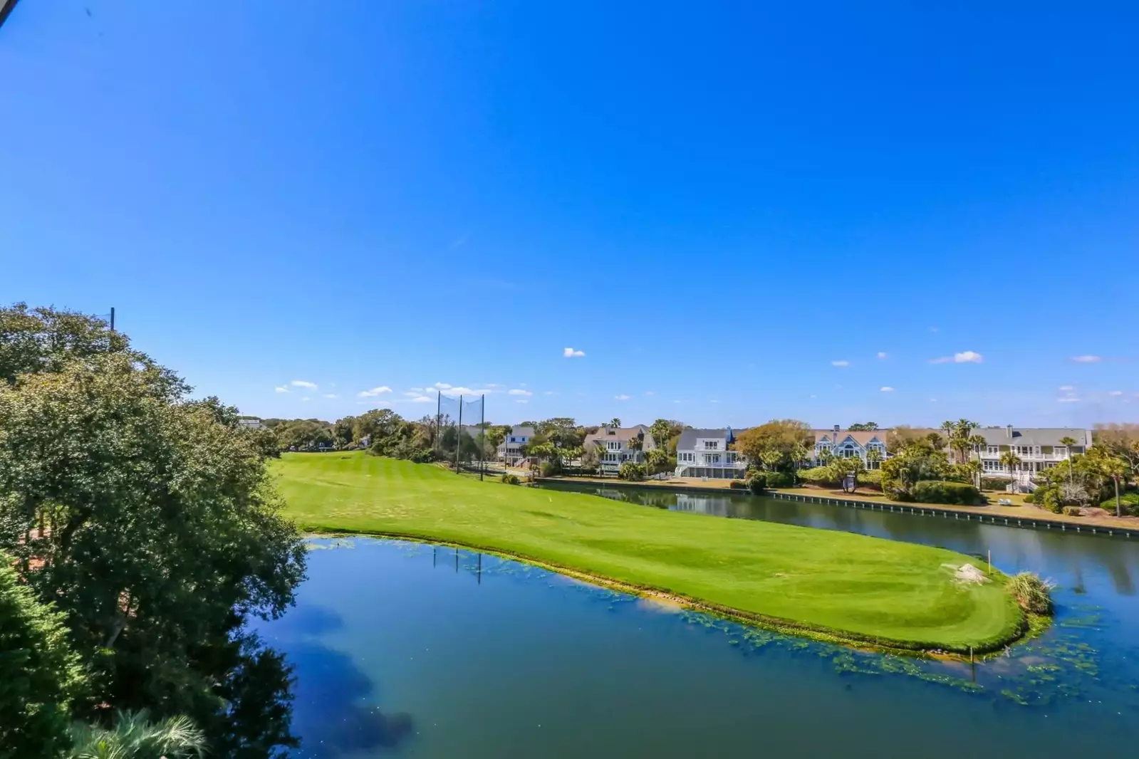 You'll also enjoy views of the Links Golf Course driving range from all three of the covered porches.