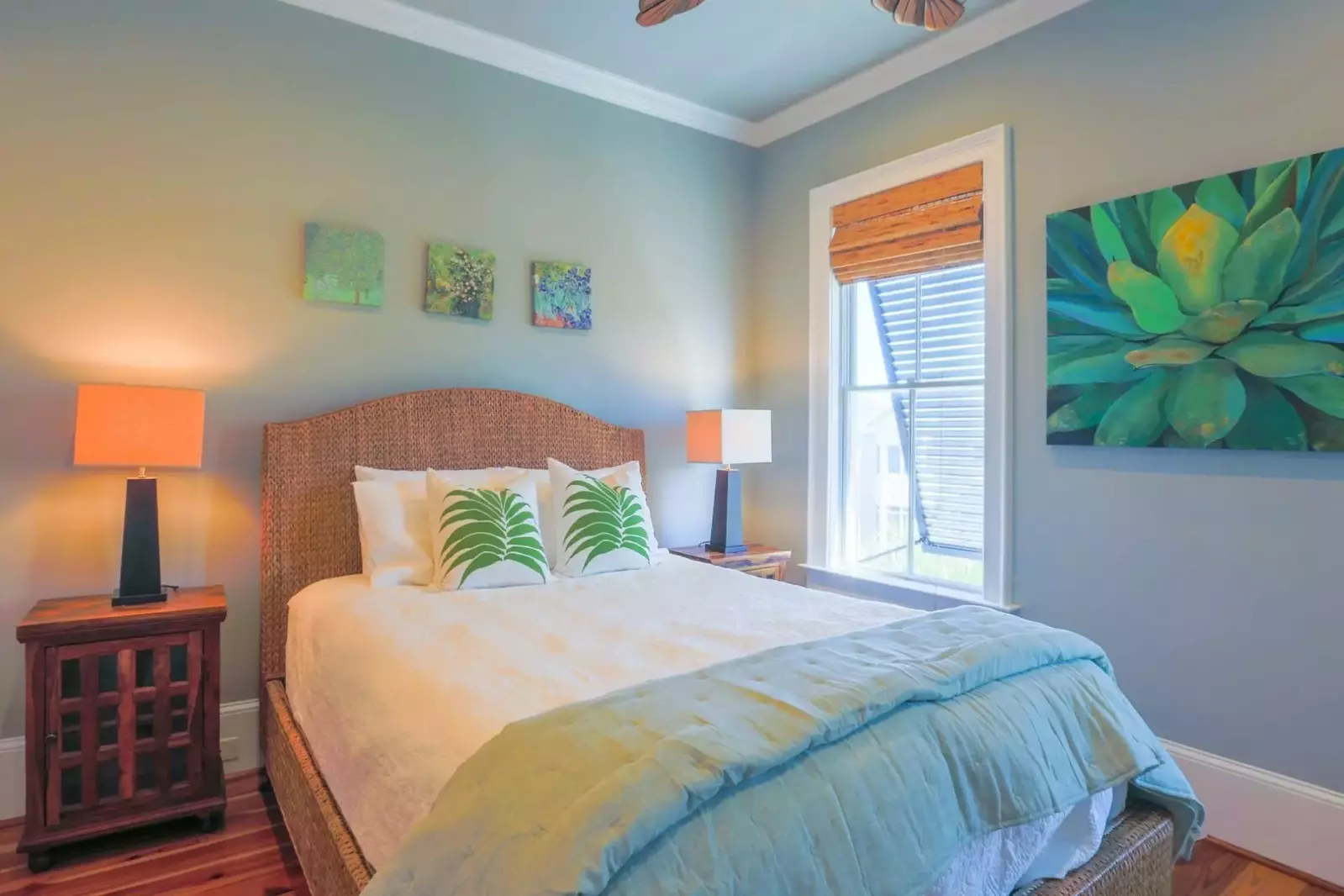The second master suite, which is also on the top floor of the home, features a queen bed.