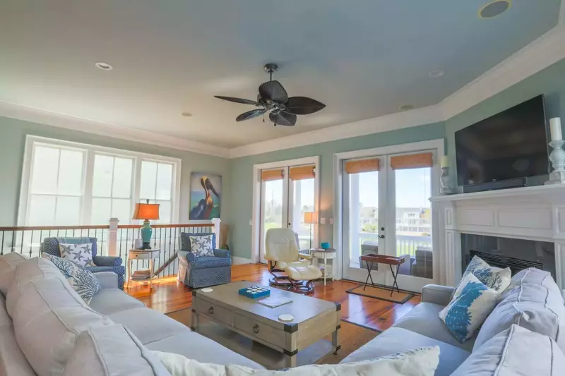 You can reach the fourth bedroom for the home via this staircase in the living room.