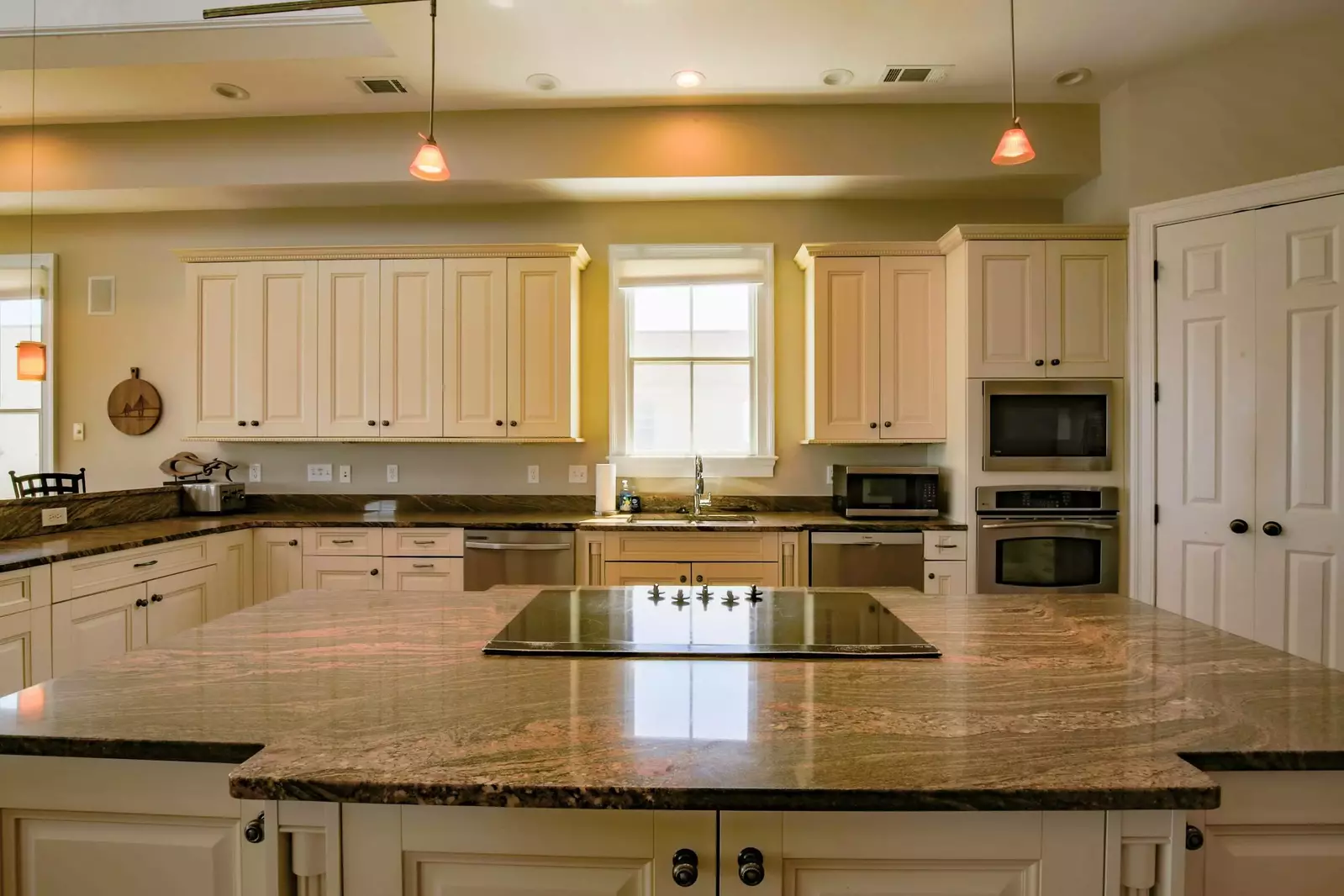 There's plenty of room in the kitchen for you and your guests to prepare your meals.