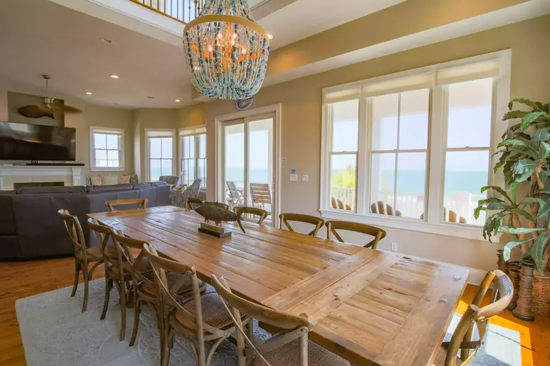 Gather all your friends & family in your group together for meals at the home's expansive dining table.