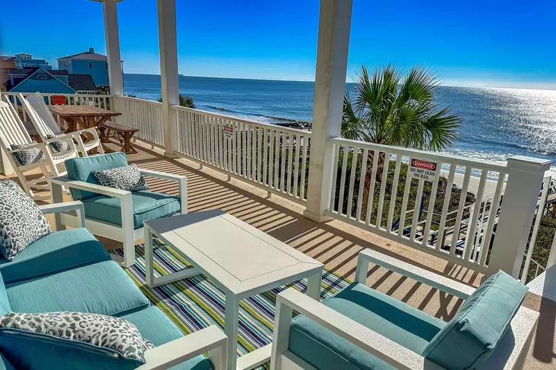 Soak up the incredible views from the covered deck off of the kitchen from the dining table, rocking chairs or seating area.