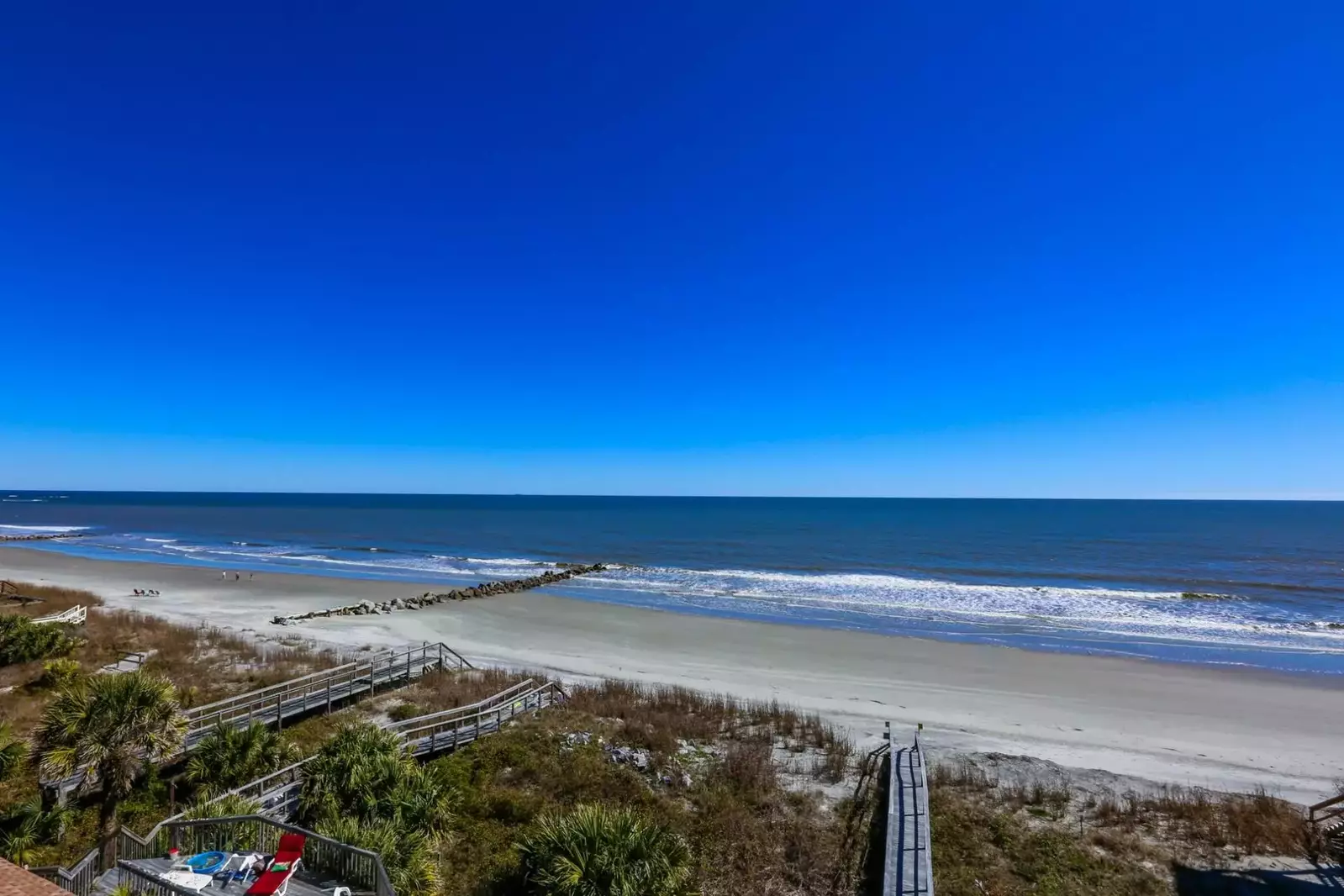 Just follow that boardwalk to the beach to feel the sand on your toes.