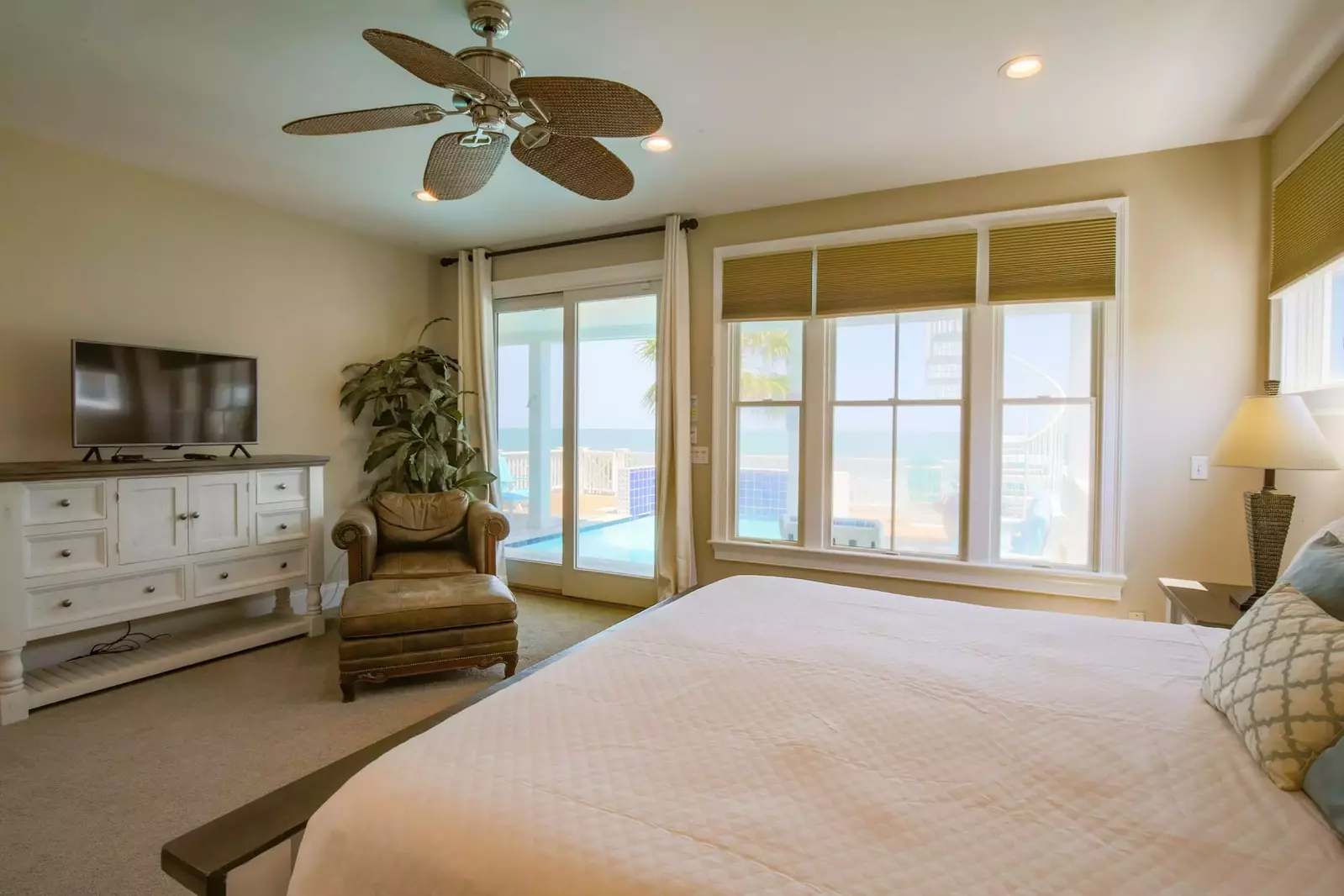 The master bedroom has incredible ocean views and sliding door access to the pool deck.
