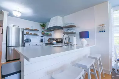 There's plenty of room in the kitchen for you and your guests to prepare your meals.
