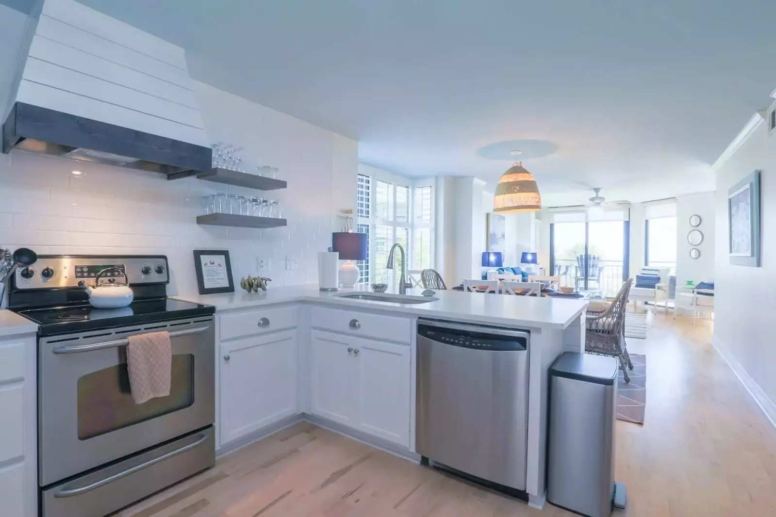 There is hardwood flooring throughout the kitchen, dining room and living room.