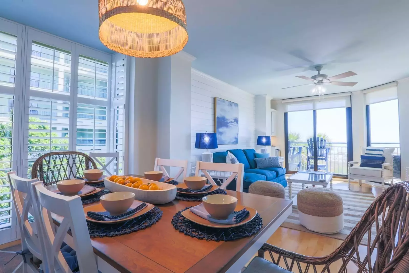 This bedroom receives terrific natural sunlight from the floor-to-ceiling windows.