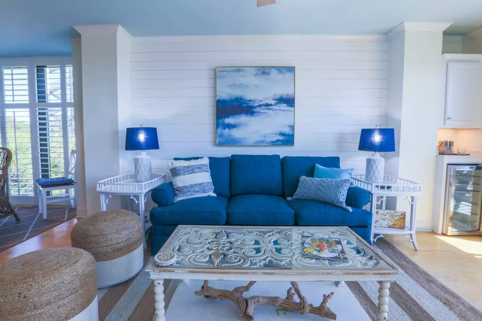 You'll find a mix of soothing coastal blues, tans & whites throughout this gorgeous oceanfront condo.