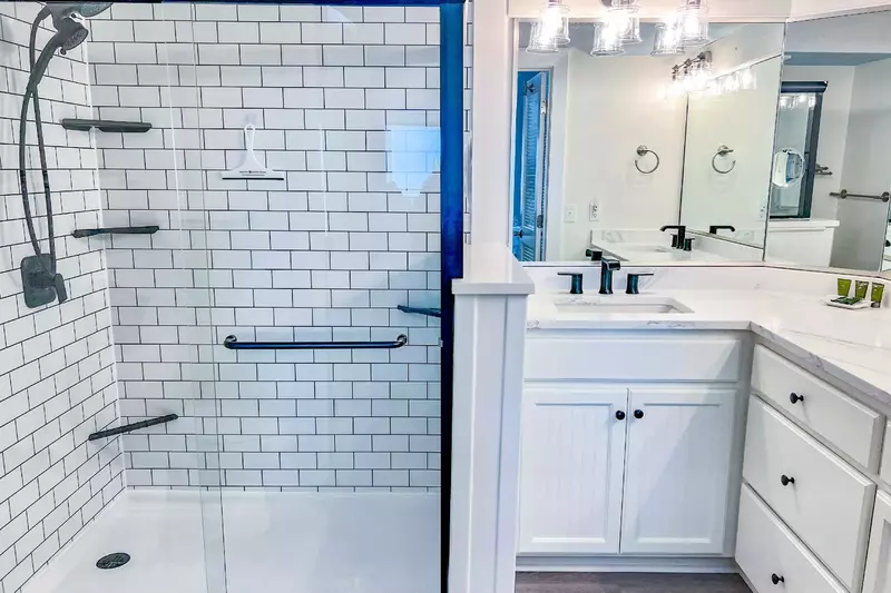Rinse your cares away in our newly renovated and beautifully tiled walk-in shower.