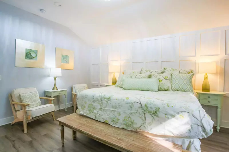 There's also a seating area and bench in this master suite.