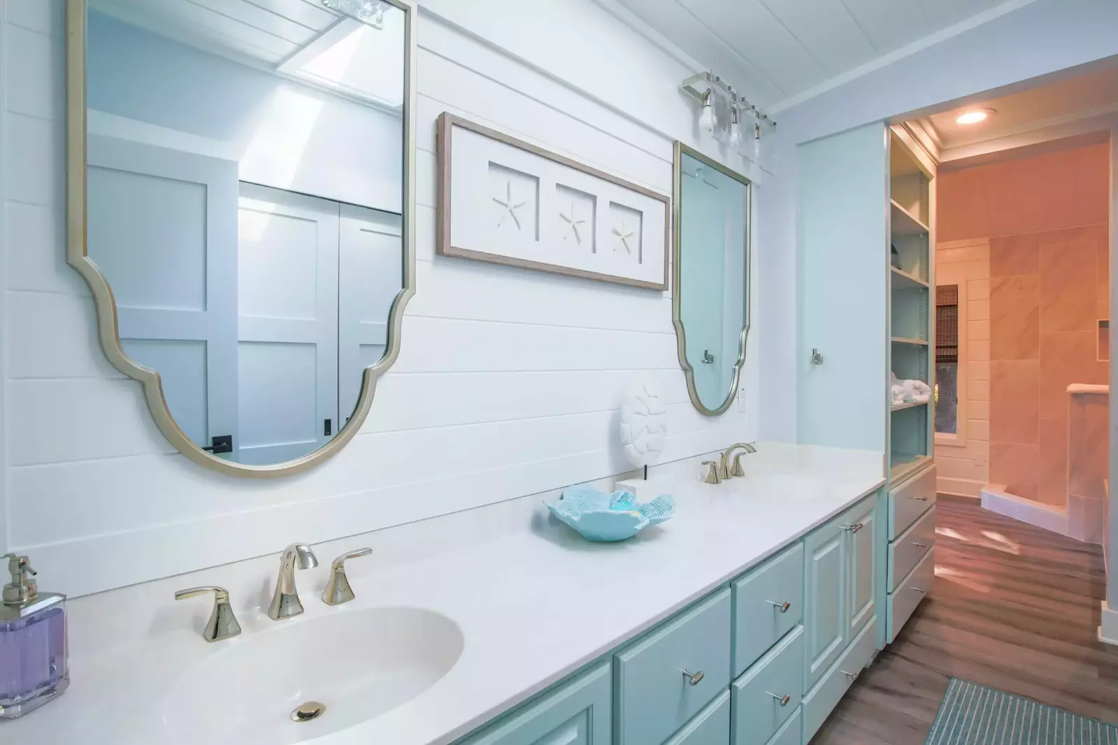 The en suite bathroom features a spacious vanity with lots of storage area for your personal belongings.