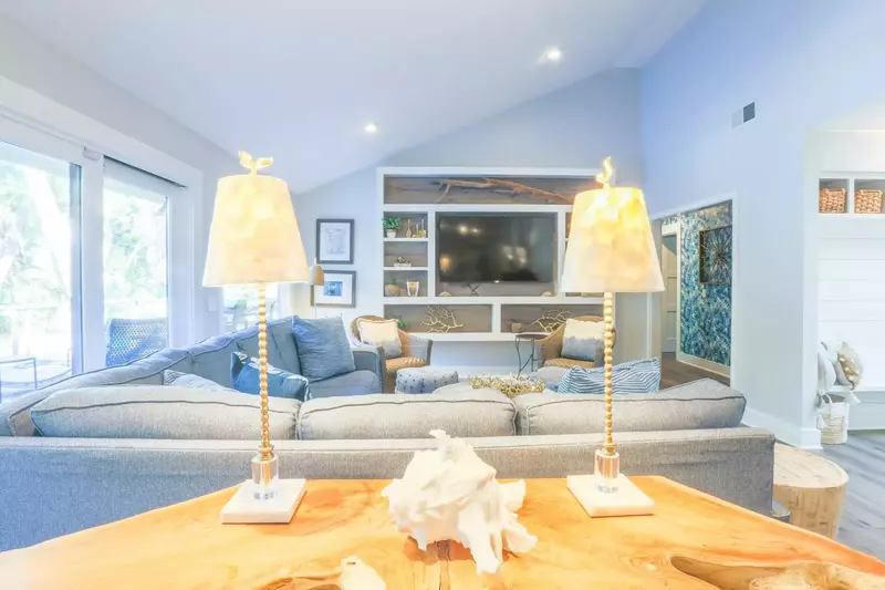 Three of the home's four bedrooms -- including the second master suite -- are on this side of the living room.