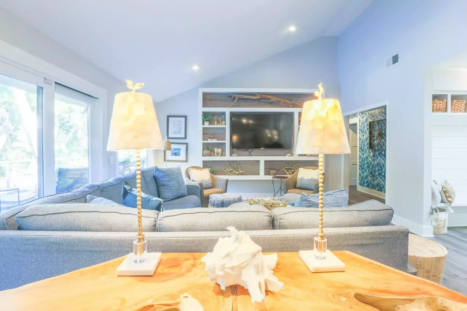 Three of the home's four bedrooms -- including the second master suite -- are on this side of the living room.