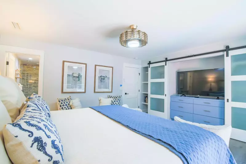 The bedroom also features an en suite bathroom.