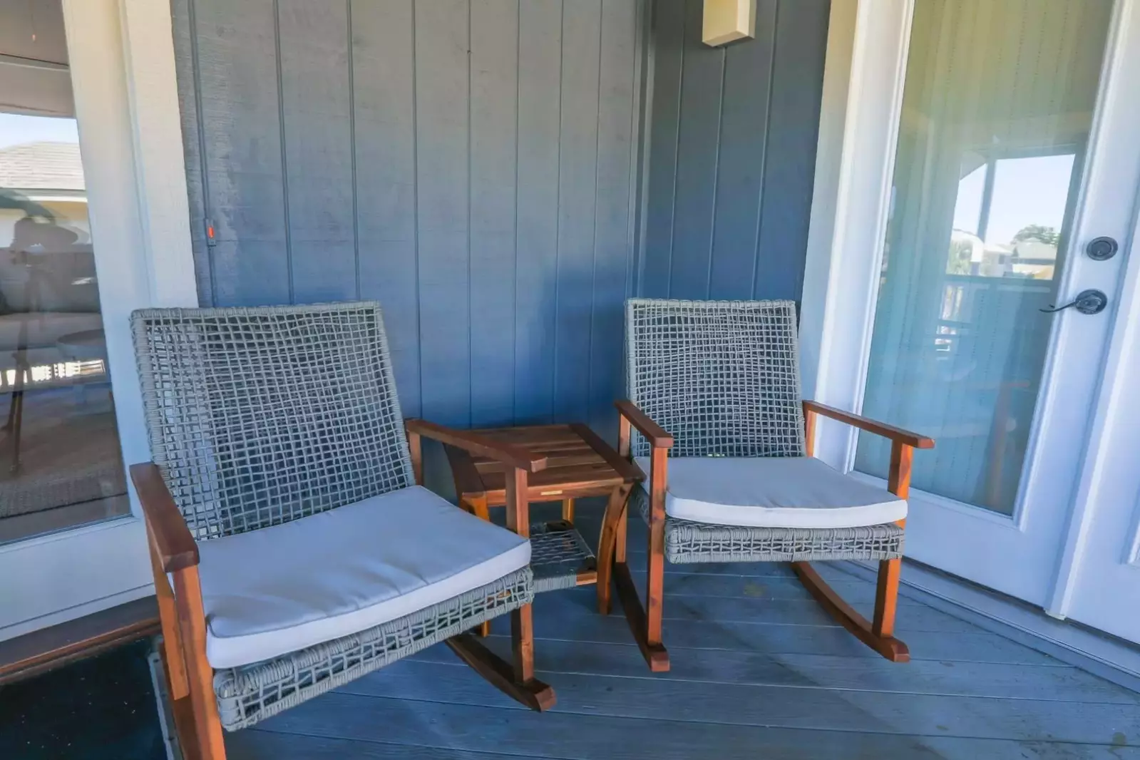 The screened porch is accessible from the exterior staircase, the front door and the master bedroom.