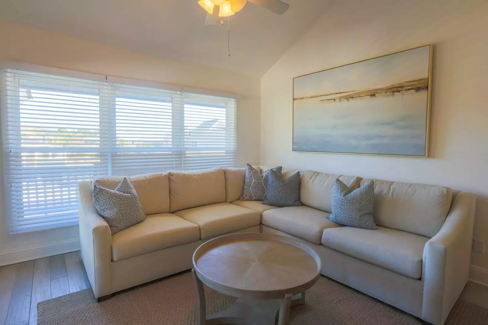 There's plenty of seating for your whole family in the home's living room.