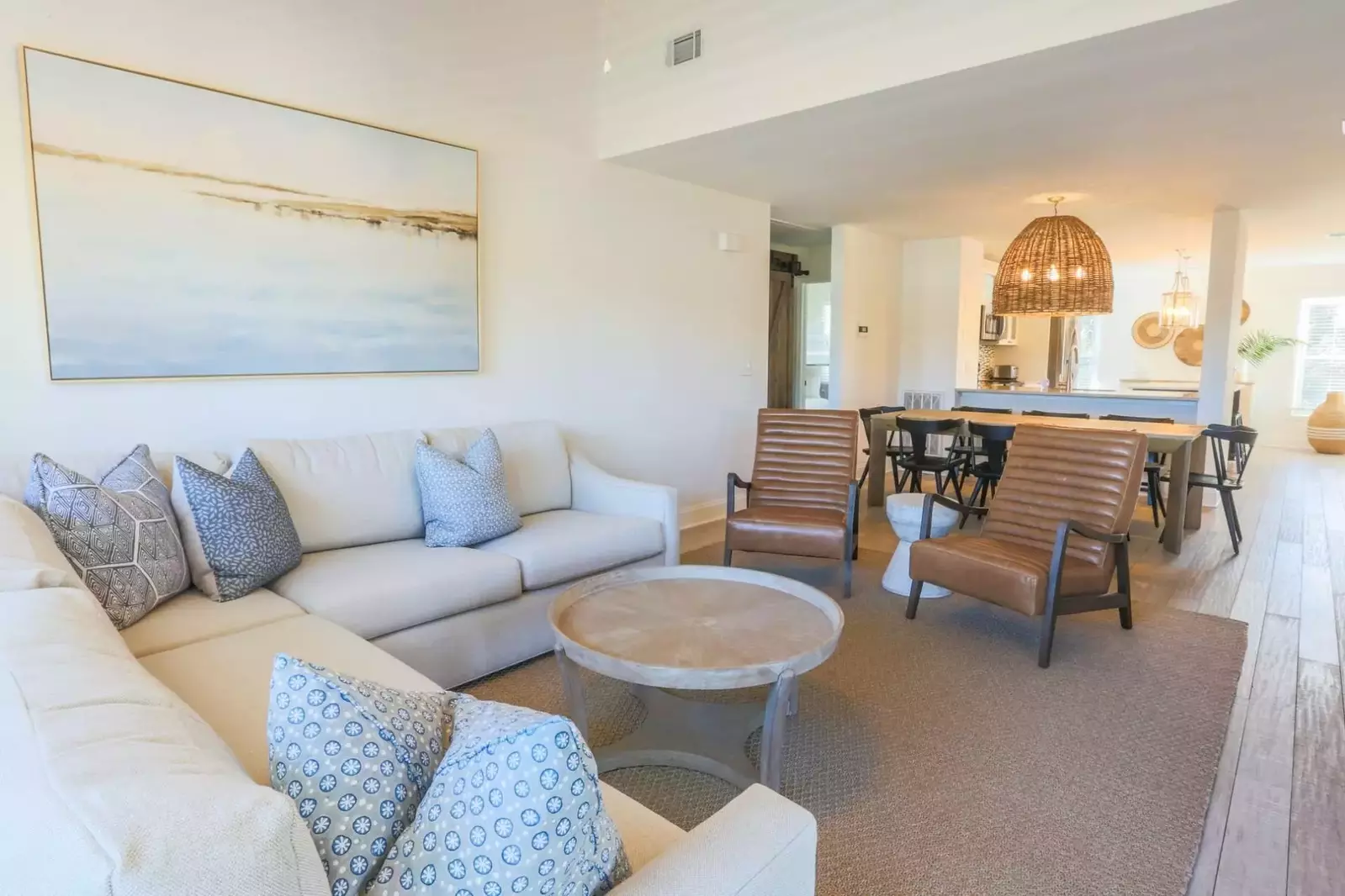 The open floor plan layout makes it very easy to interact with guests in the kitchen, dining area & living room areas.