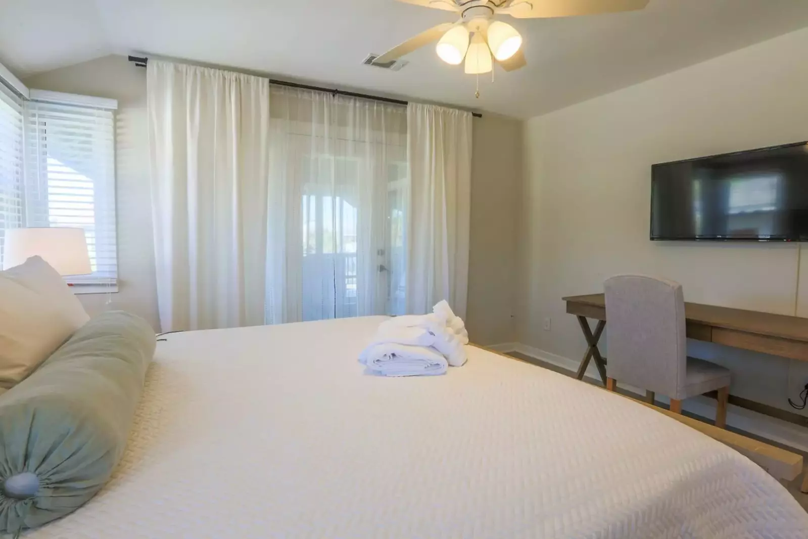 The master bedroom suite also has desk, fan and TV with TiVO, which provides access to Netflix, Hulu, Disney+, etc.