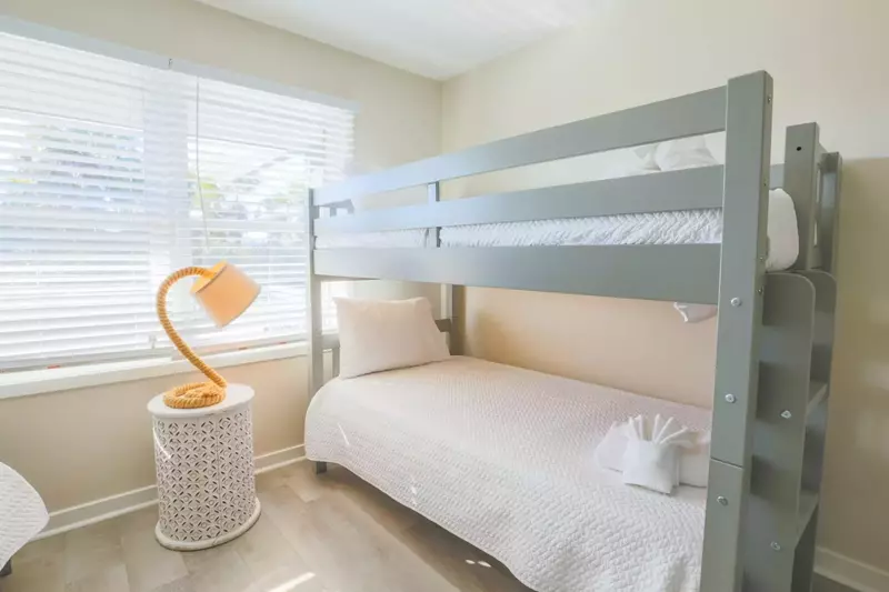 This room features all new furniture and mattresses.
