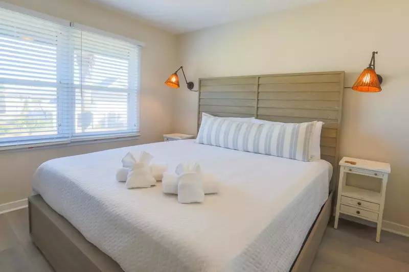This bedroom is located in the front corner of the cottage and looks out onto the front yard.