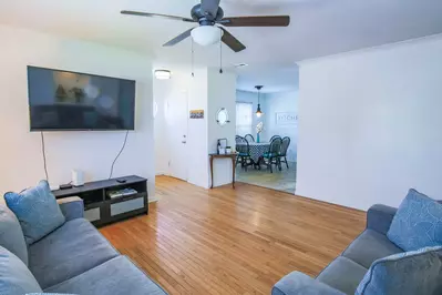 When you step inside the front door, you'll enter the home's comfortable living room.