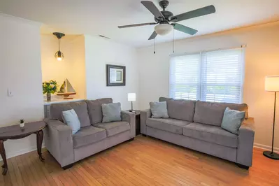 There's plenty of room in the living room for your family to relax and enjoy one another's company.